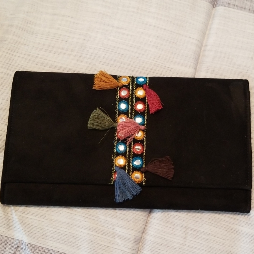 Francescas never before used boho clutch